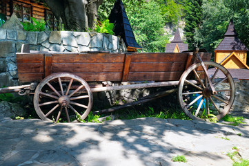 Fototapeta na wymiar old wooden cart. Retro agricultural mode of transport .