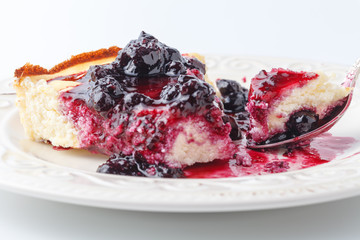 delicious cheesecake with strawberries on a plate