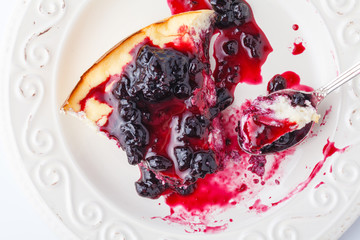 delicious cheesecake with strawberries on a plate