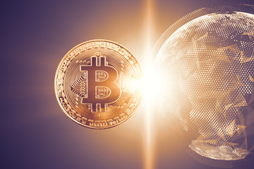 gold bitcoin with bright background