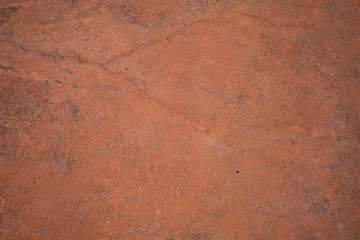 old cracked wall or orange cement floor texture and background