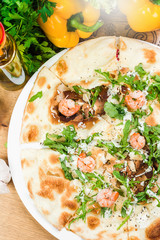 Traditional Italian pizza, vegetables, ingredients. Pizza is cooking in the oven. Pizza menu