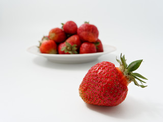 red ripe strawberry appetizing berry on a white background
