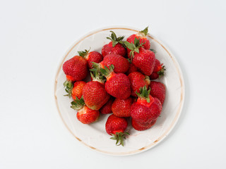 red ripe strawberry appetizing berry on a white background