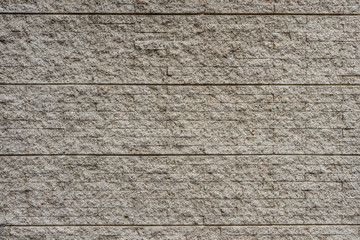 Pebble concrete tile wall. The new decoration of new-fashioned building.