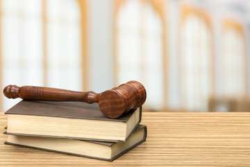 Wooden gavel on table close up. Justice concept