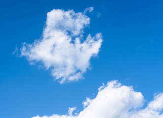 Bright blue sky with white clouds. Great background