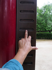Person doing exercise on a outdoors park fingers ladder