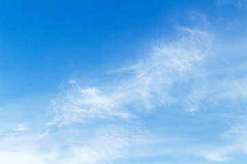 Naklejka na ściany i meble Blue sky with picturesque fluffy clouds background