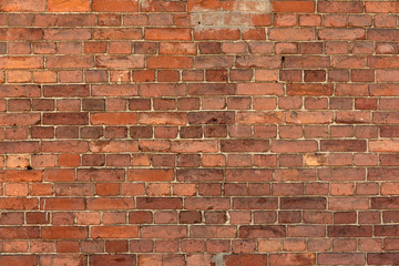 Antique brick wall of dark red color. Creative background for images and fantasy designer. horizontal photograph of a dark background for design and text