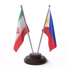 Iran and Philippines, two table flags isolated on white background. 3d image