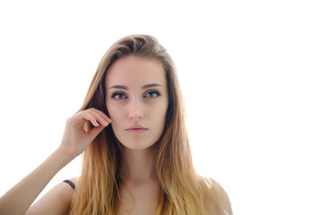 Fototapeta premium Photograph of a portrait of a beautiful fashionable beauty woman girl with long dark flowing hair, isolate on a white background. She is standing in different poses and smiling.