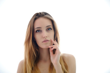 Fototapeta premium Photograph of a portrait of a beautiful fashionable beauty woman girl with long dark flowing hair, isolate on a white background. She is standing in different poses and smiling.