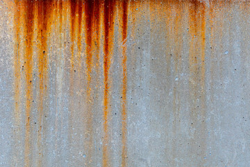 Rusty metal stain texture on concrete wall for old industry building background - obrazy, fototapety, plakaty