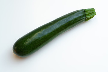 A courgette isolated on white