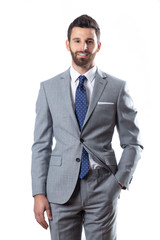 A young man wearing suit on a white background