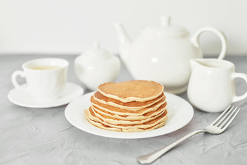Independence Day on July 4th, American pancakes on the table next to the dishes.