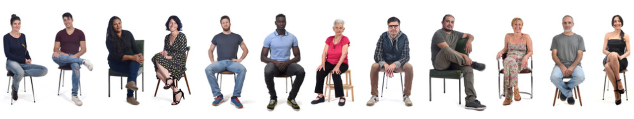 group of mixed people sitting on white