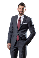 A young man wearing suit on a white background