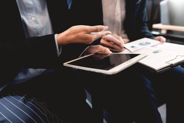 business people and coworker colleagues discussing explanations about week working plan project cooperating in modern coworking office.
