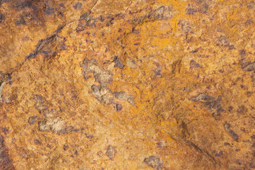 Rusty materials on stones 12