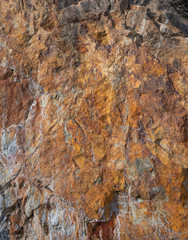 Rusty materials on stones 2