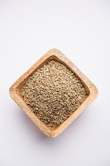 Pearl Millet or Bajra seeds also known as sorghum, in a bowl, selective focus