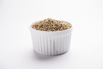 Pearl Millet or Bajra seeds also known as sorghum, in a bowl, selective focus