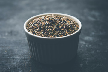 Pearl Millet or Bajra seeds also known as sorghum, in a bowl, selective focus