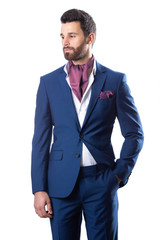 A young man wearing suit on a white background