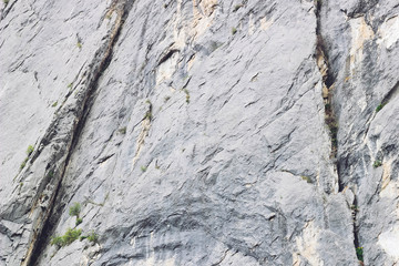 Rock texture background with cracks. Natural background. Closeup of stone, horizontal image.
