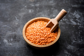 Red Lentil or Lal Masoor ki dal in a bowl, selective focus