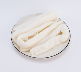 Steamed vermicelli roll on white background