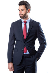 A young man wearing suit on a white background