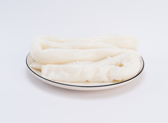 Steamed vermicelli roll on white background