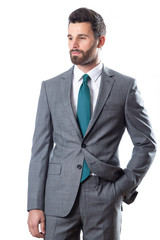 A young man wearing suit on a white background