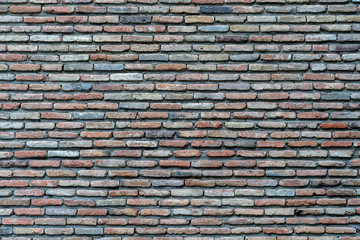 Fototapety  Background old vintage brick wall texture, closeup