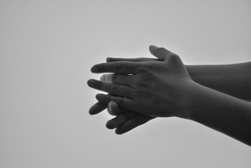 Close up of flamenco dancer hands making rhythm by claping in black and white. Washing hands...