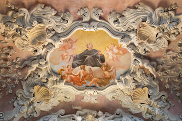 COMO, ITALY - MAY 10, 2015: The baroque fresco of St. Nicholas of Tolentino  in side nave of church Chiesa di San Agostino by Morazzone from 16. cent.