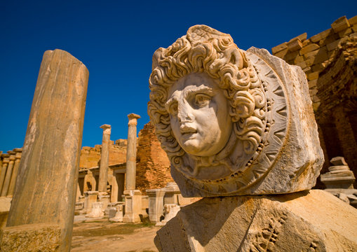 A carving of a head of Medusa on a portico, Leptis Magna, Libya