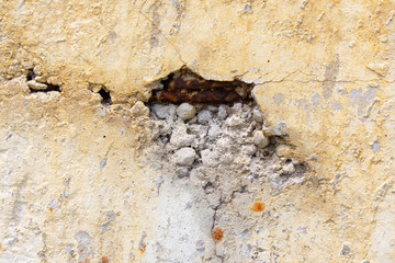 hole in cement wall with reinforcement