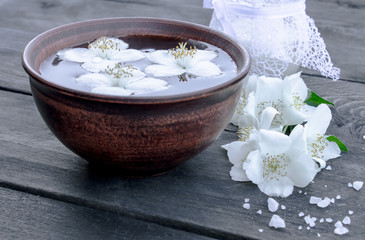 Jasmine flowers float on water. Relaxation concept