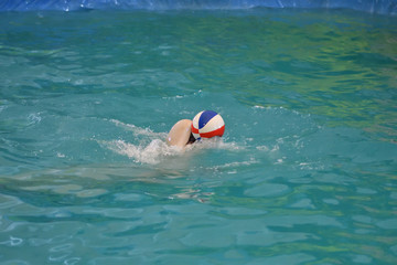 Belukha performs an exercise ball