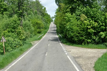 Front view of a straight road in the slope.