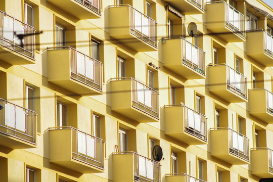 Balconies and windows in a block of flats in Poland.
