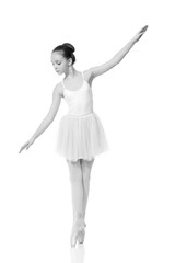 Naklejka premium young girl ballerina posing on white background