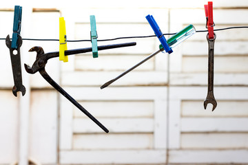 plier, screwdriver and wrench holding with clothespin  