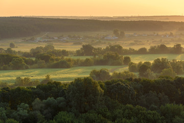 Fototapeta premium Morning landscape - flood meadows and forest at sunrise. Voronezh region, Russia