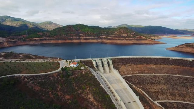Aerial. Portuguese dam Odelouca, Monchique, filmed from the sky.