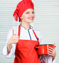 Housewife with cooking utensil. happy woman cooking healthy food by recipe. professional chef in...